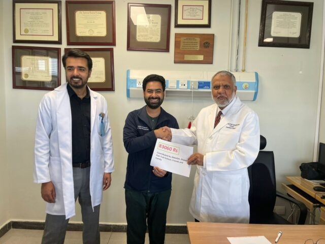 Pak-Turk School students presented Rs. 83,060 donaion to Dr Saeed Akhter, President PKI for flood affectees by Paeds Surgeon Dr Naeem Liaqat.